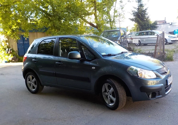 Suzuki SX4 cena 26900 przebieg: 49500, rok produkcji 2009 z Miastko małe 277